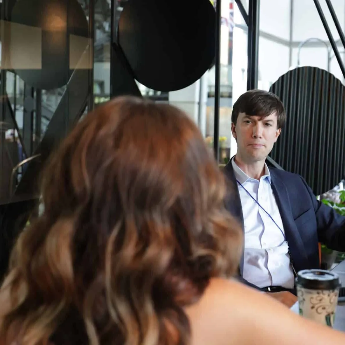 coach having conversation with another coach